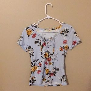 Cute floral Tee. Laced tie in front! Wishful park!